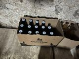 a cardboard box with six bottles of beer in it