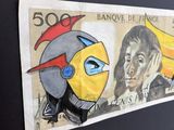 a picture of a picture of a man and a woman on a bank note