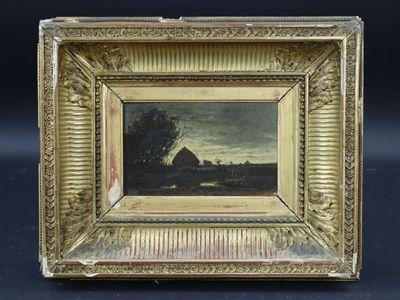 un tableau représentant un paysage, dans un cadre doré, sur fond noir
