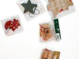 many different types of christmas decorations on a white surface