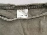 a close up of the back of a shirt with a label on it