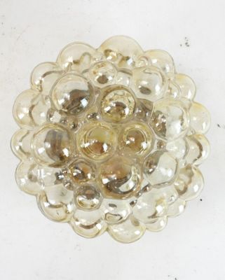 a glass plate with a flower design on it