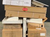 boxes stacked on top of each other on a pallet in a warehouse