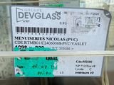 a sign that says devglas on it in front of a window