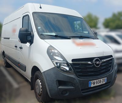 a white van that is parked in a parking lot