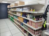a gun on a shelf in a grocery store