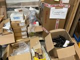 many boxes of assorted items on a pallet in a warehouse