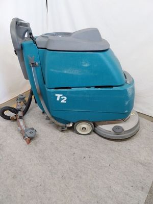 une machine bleue posée sur le sol