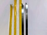 three rulers and a ruler sitting on a table