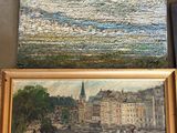 peinture d'une scène de rivière et peinture d'une ville au bord d'une rivière