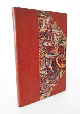 an image of a red book with a marbled design on it