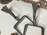 a lot of old rusty tools that are on the table