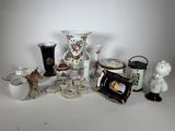 many different vases that are sitting on a table