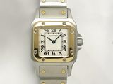 an image of a silver and gold wrist watch with roman numerals