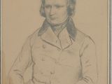 portrait of a man in a military uniform with his hands in his pockets