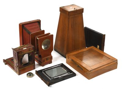 many different types of antique cameras on a white background