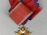 an image of a medal with a star on it