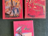 trois livres pour enfants sont posés sur une table les uns à côté des autres