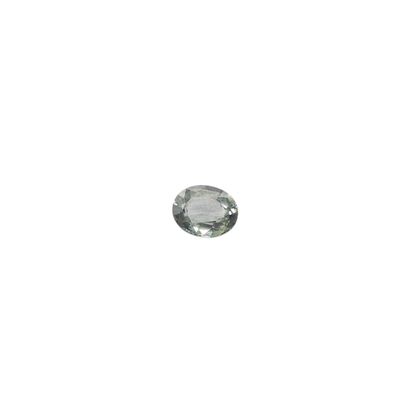a close up of a white diamond on a white surface