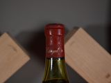 a bottle of wine that is sitting on a table