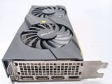 a close up of a video card with a fan on it