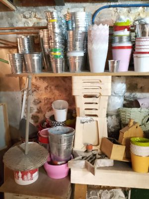 many cups and cups on the shelves in the kitchen