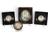 three framed pictures of a woman and a child on a wall