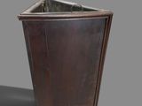 a metal trash can with a lid on a gray background