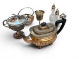 a silver tea pot and a silver teapot on a white background
