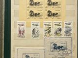 a picture of a picture of some stamps on a wall