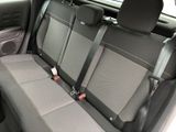 the back seats of a car with two rows of seats in it