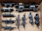 a box with many different types of toy trains in it