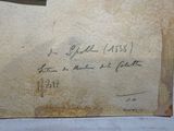 a piece of paper with writing on it and a pair of scissors