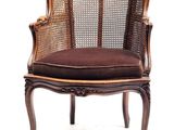 an image of a brown chair with a brown cushion on it