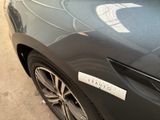 a close up of a car with a sticker on it