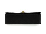 black quilted leather clutch bag with gold clasp