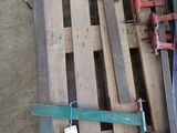 a wooden pallet that has a bunch of tools on it