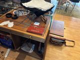 a coffee table with a bunch of items on top of it