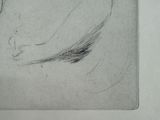 a drawing of a woman ' s face in profile with her eyes closed