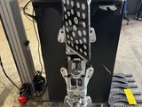 an image of a machine that is working on a piece of metal