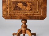 a wooden table with a picture of a horse and rider on it