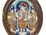 a picture of a decorative plate with a picture of a hindu god