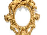an image of a gold picture frame with cherenshes and cherenshes on it