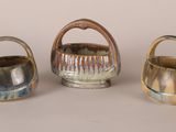 three different types of vases with handles and handles on a white surface