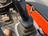 a close up of a person ' s foot on a vehicle ' s dashboard