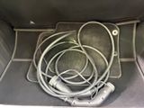 a bunch of wires in the trunk of a car