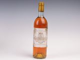 a bottle of wine that is sitting on a table