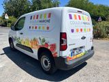 a van that is parked on the side of the road