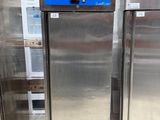 three stainless steel refrigerators are on display in a store