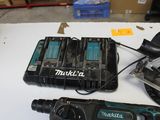 two tools that are sitting on a table